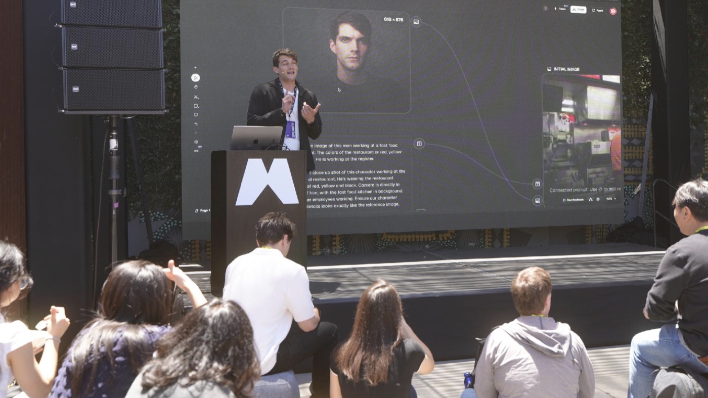 Simone presenting AI work on stage